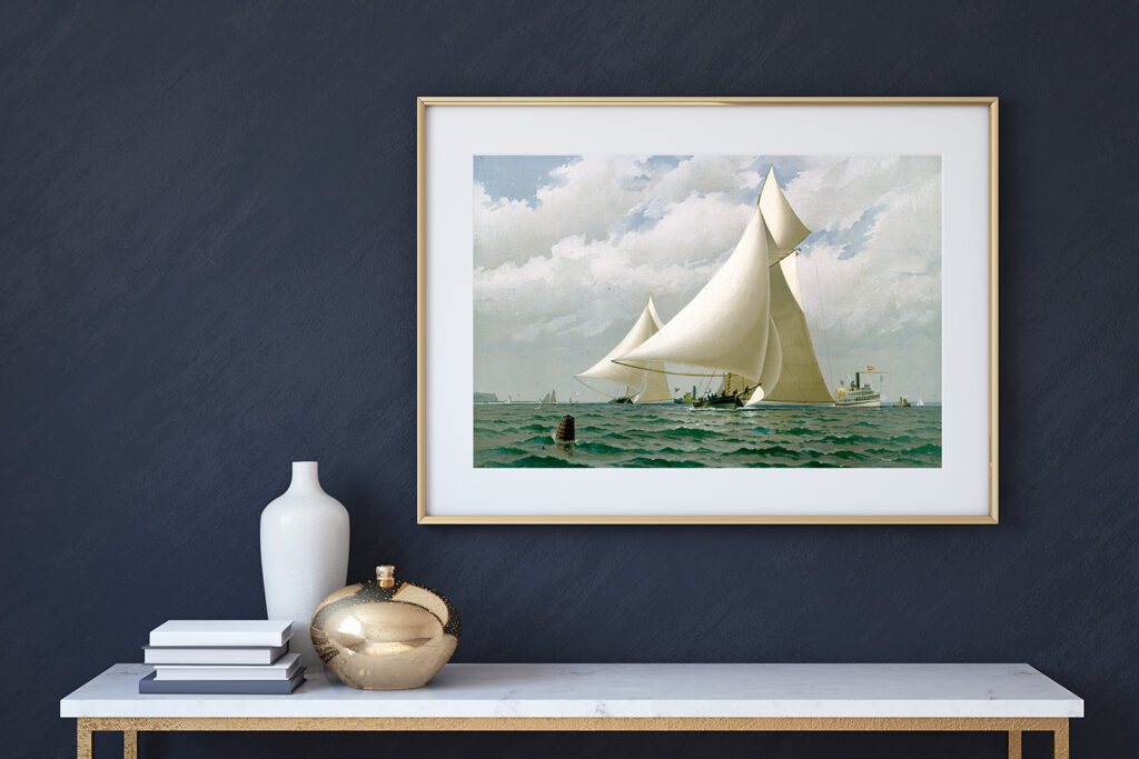 framed artwork of a boat above an entertainment center