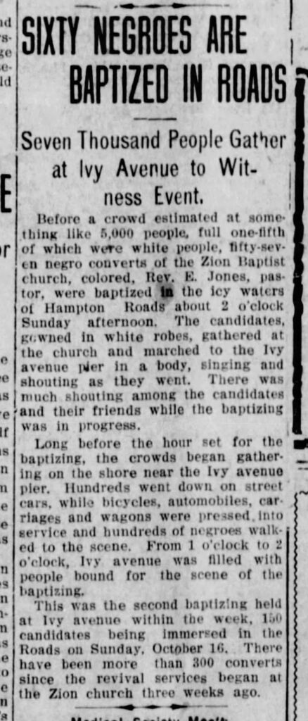 A black and white clip from a newspaper. The article is titled Sixty Negroes Are Baptized In Roads